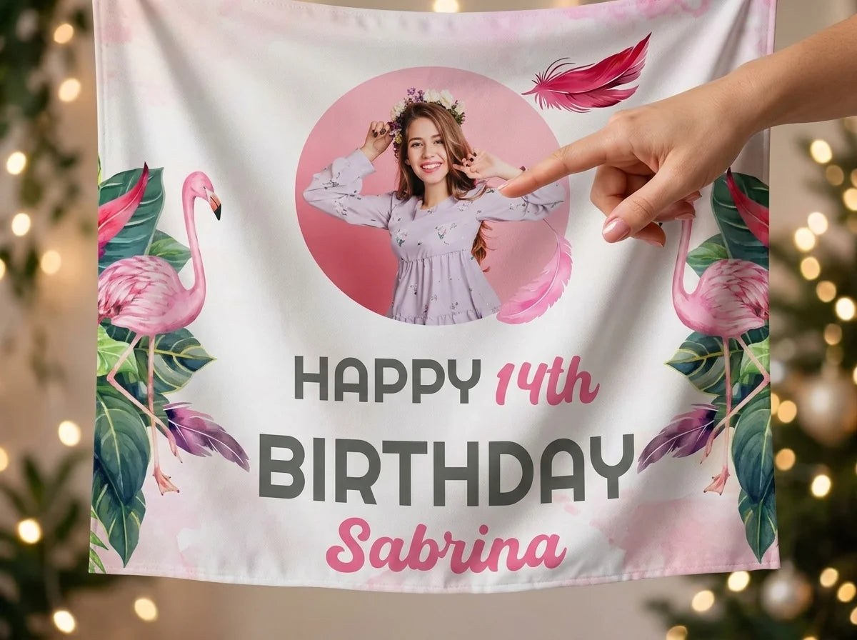 Close-up of the personalised name and photo printed on the Tropical Flamingo Theme Birthday Party Banner