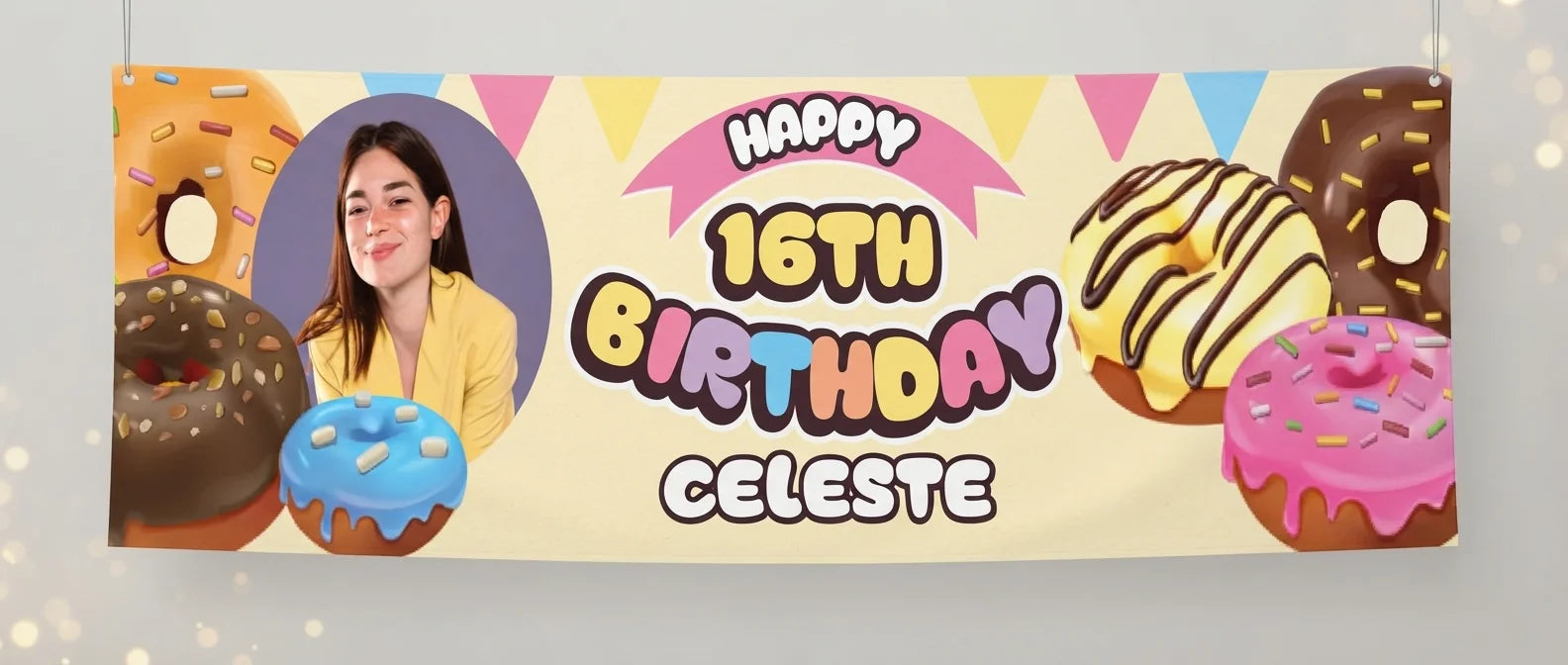Personalised Donut Theme Birthday Party Banner displayed against a plain studio background