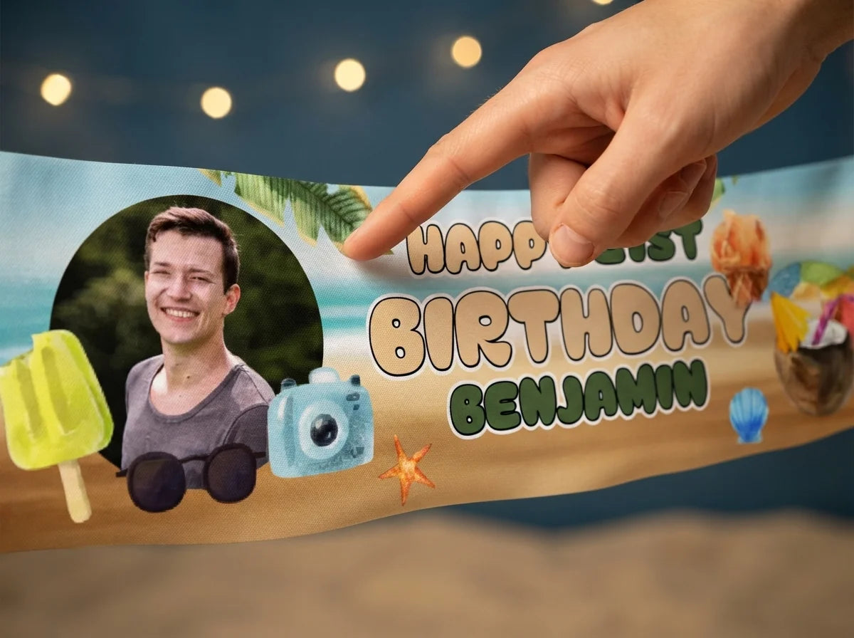 Close-up of the personalised name and photo printed on the Beach Travel Birthday Party Banner