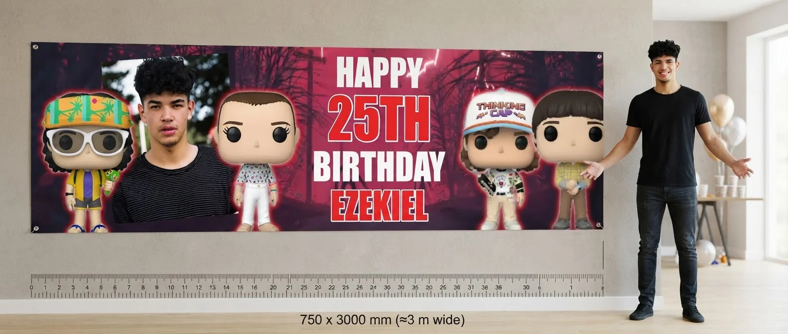Person standing beside the Stranger Things Birthday Party Banner for scale, with size guide showing 750 x 3000 mm