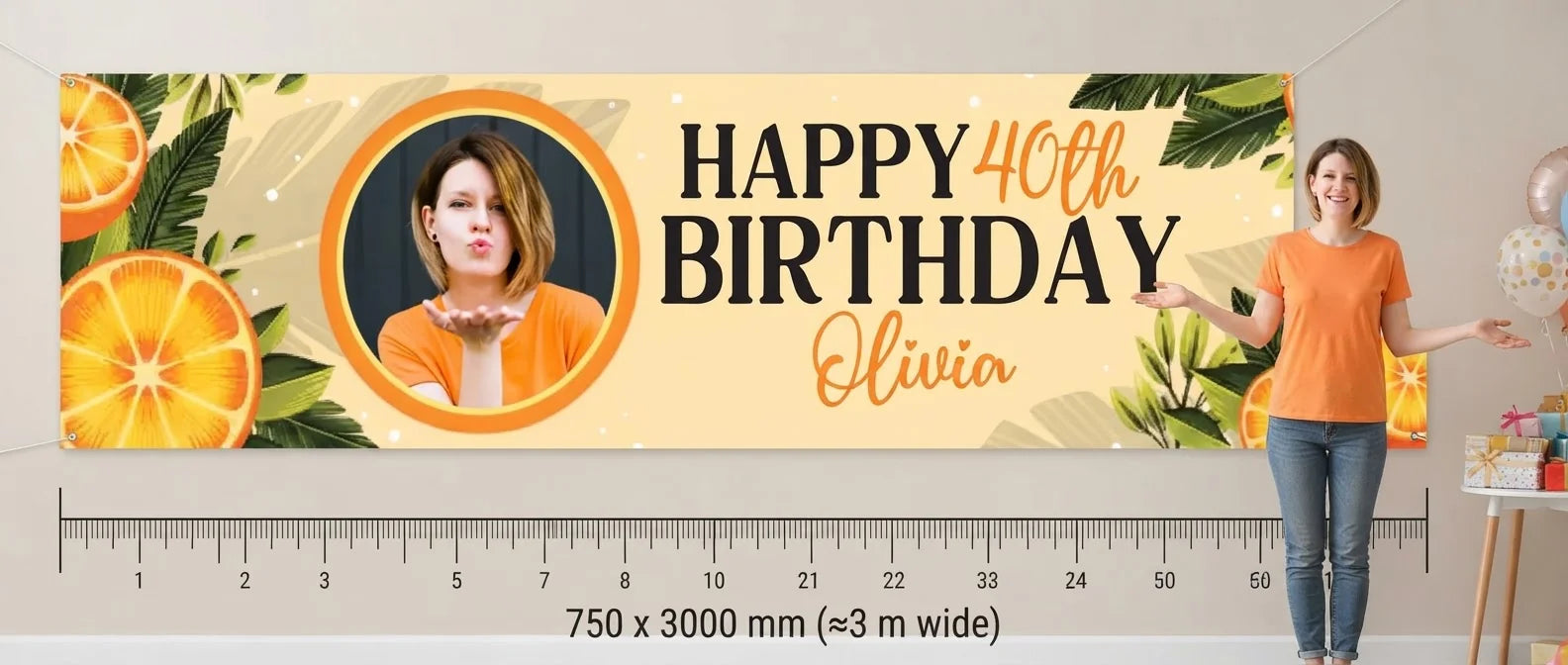 Person standing beside the Orange Citrus Birthday Party Banner for scale, with size guide showing 750 x 3000 mm