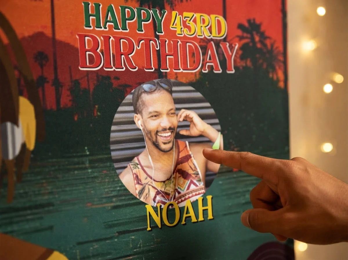 Close-up of the personalised name and photo printed on the Reggae Theme Birthday Party Banner