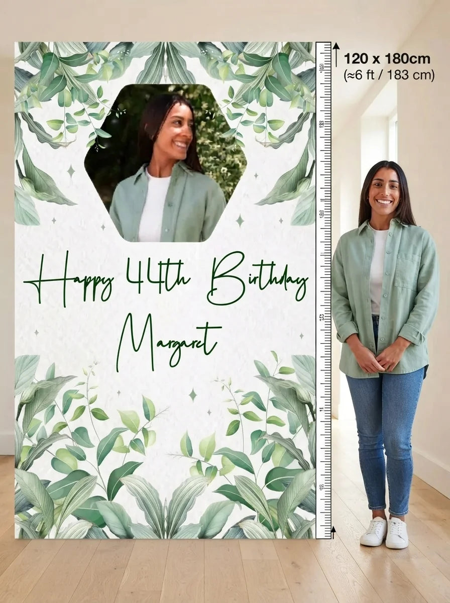 Person standing beside the Botanical Theme Birthday Party Mega Card for scale in a size guide