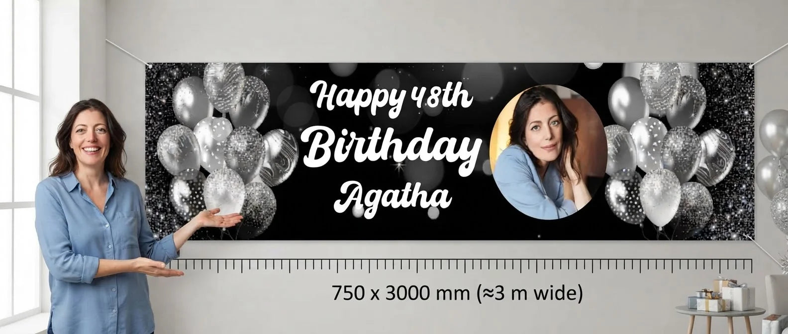 Person standing beside the Silver Balloons Birthday Party Banner for scale, with size guide showing 750 x 3000 mm