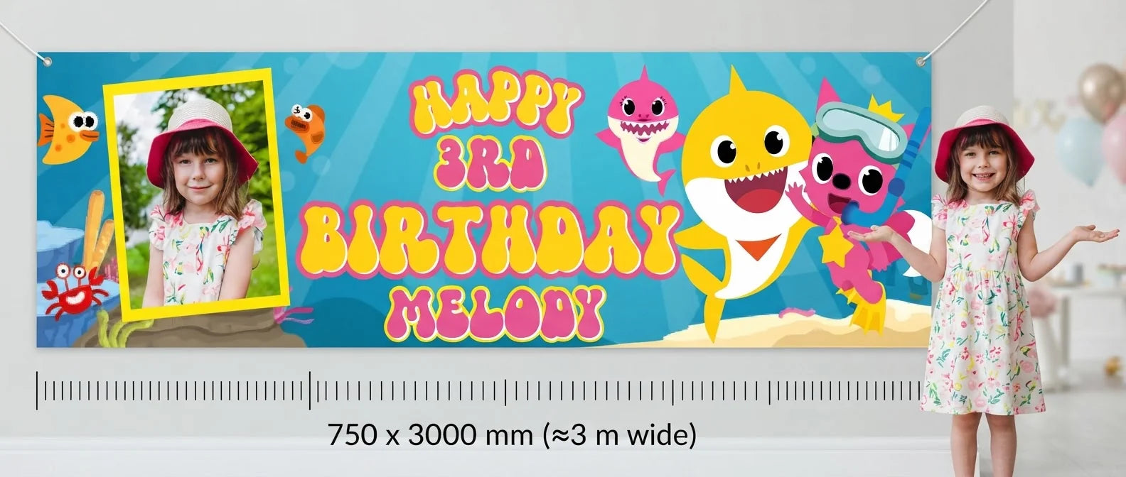 Person standing beside the Baby Shark Birthday Banner for scale, with size guide showing 750 x 3000 mm