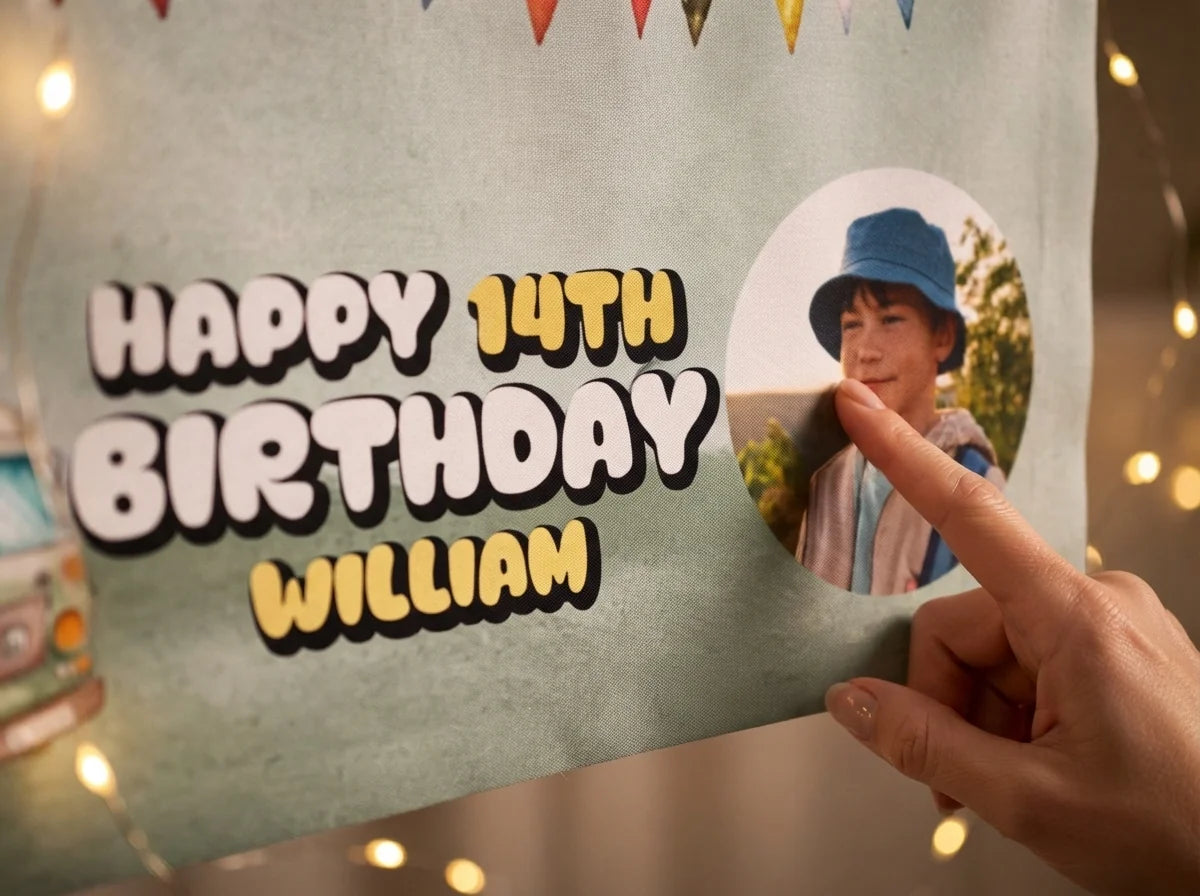Close-up of the personalised name and photo printed on the Camper Van Birthday Party Banner