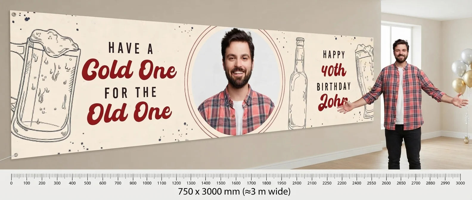 Person standing beside the Cold One For The Old One Birthday Party Banner for scale, with size guide showing 750 x 3000 mm