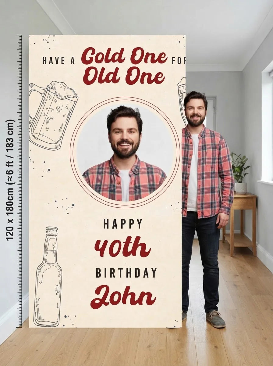 Person standing beside the Cold One For The Old One Birthday Party Mega Card for scale in a size guide