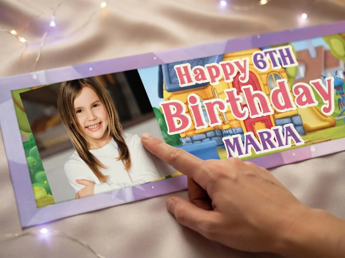 Close-up of the personalised name and photo printed on the Doc McStuffins Birthday Banner