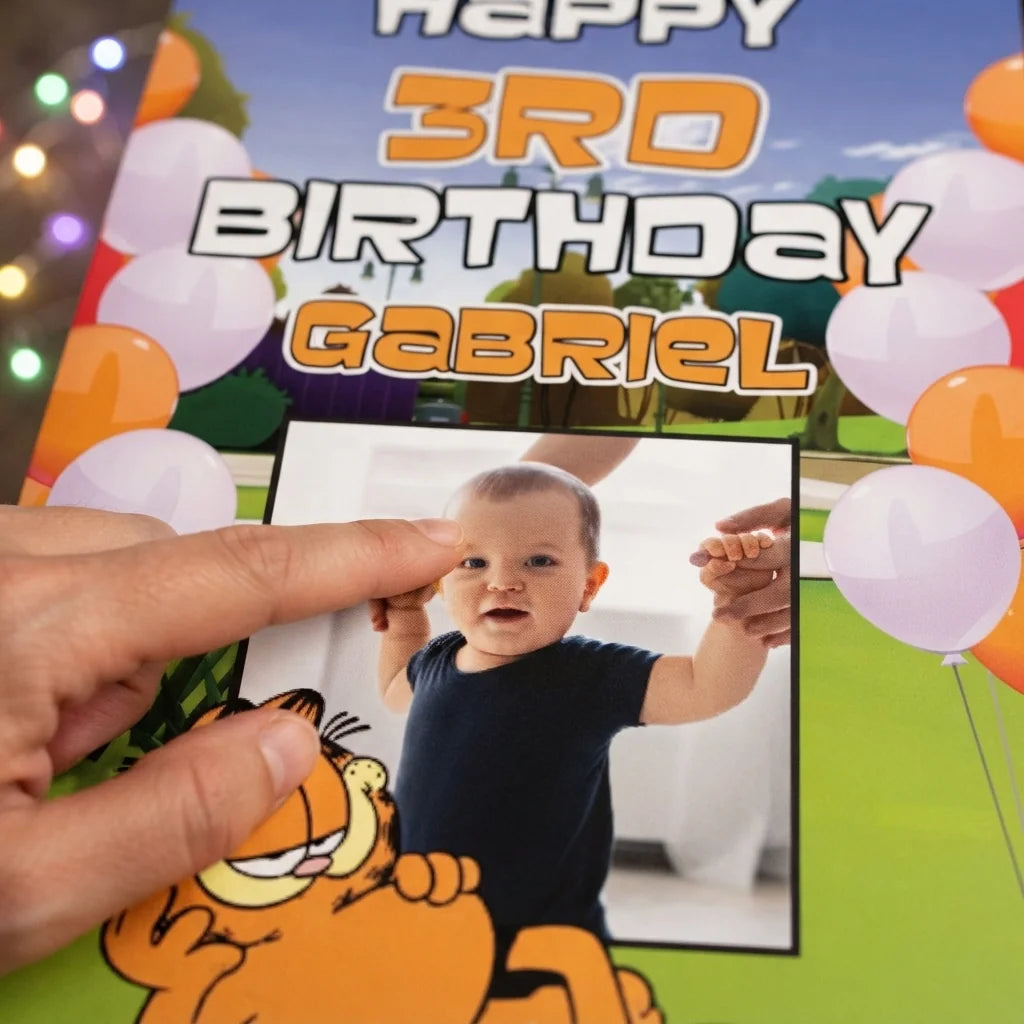 Close-up of the personalised name and photo printed on the Garfield Mega Card