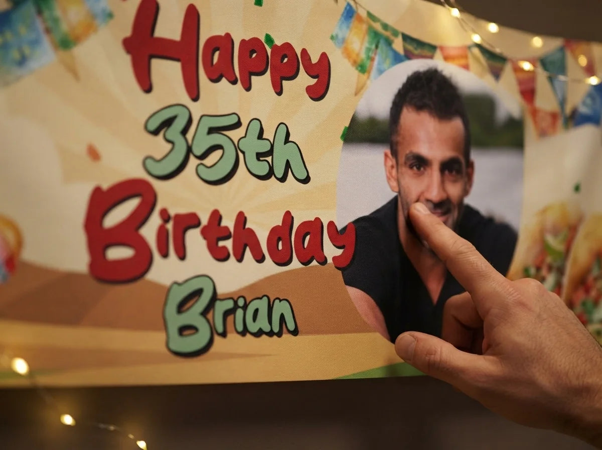 Close-up of the personalised name and photo printed on the Mexican Fiesta Birthday Party Banner