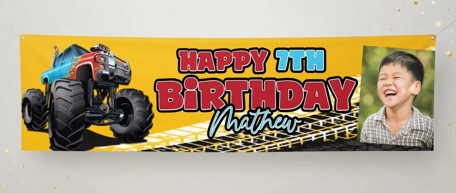 Personalised Monster Truck Birthday Banner displayed against a plain studio background