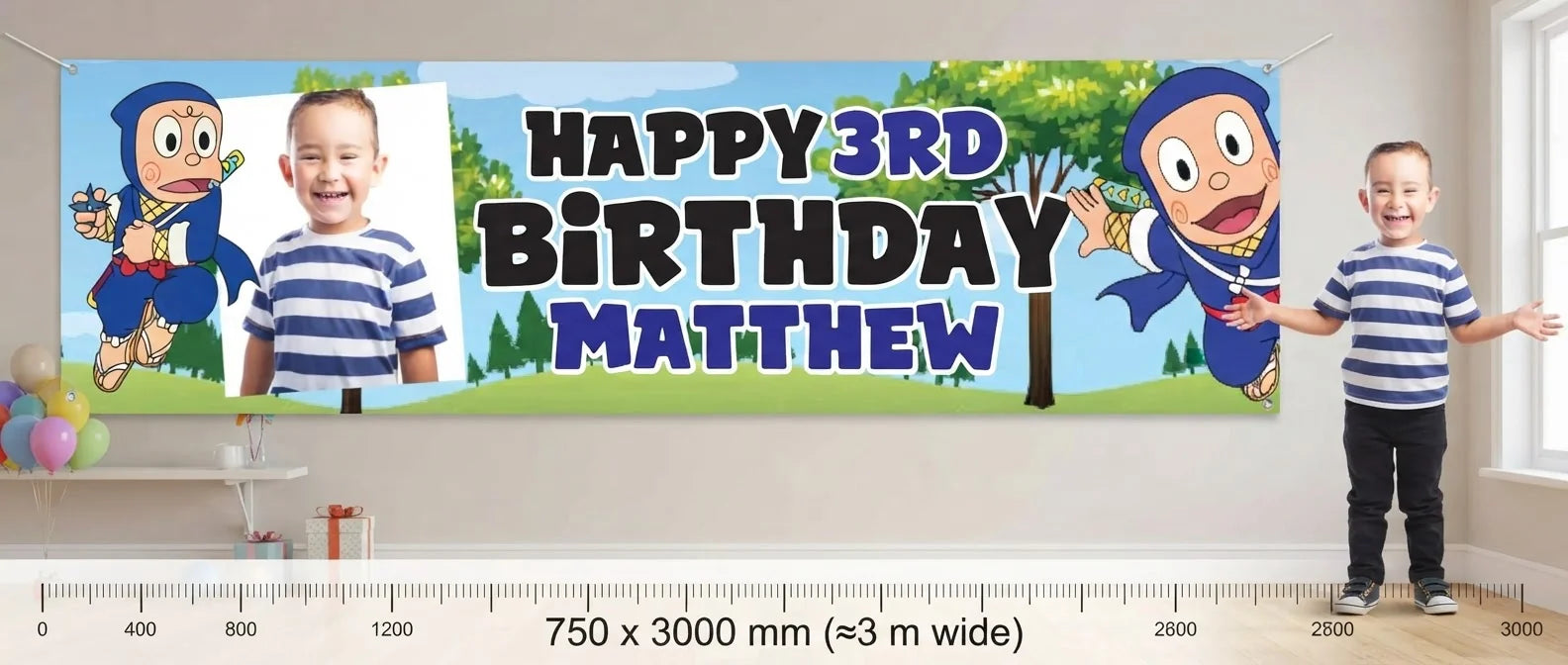 Person standing beside the Ninja Hattori Birthday Banner for scale, with size guide showing 750 x 3000 mm