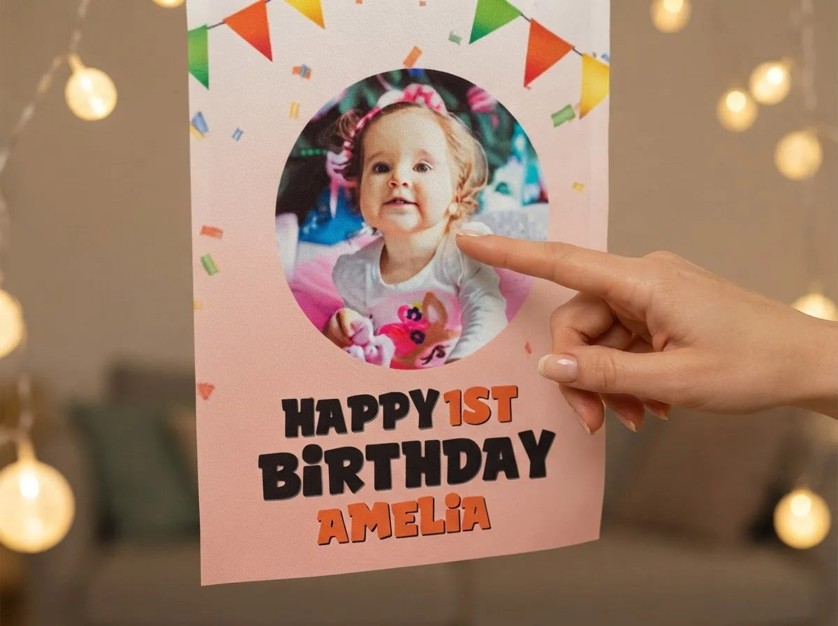 Close-up of the personalised name and photo printed on the Oliver and Company Birthday Banner