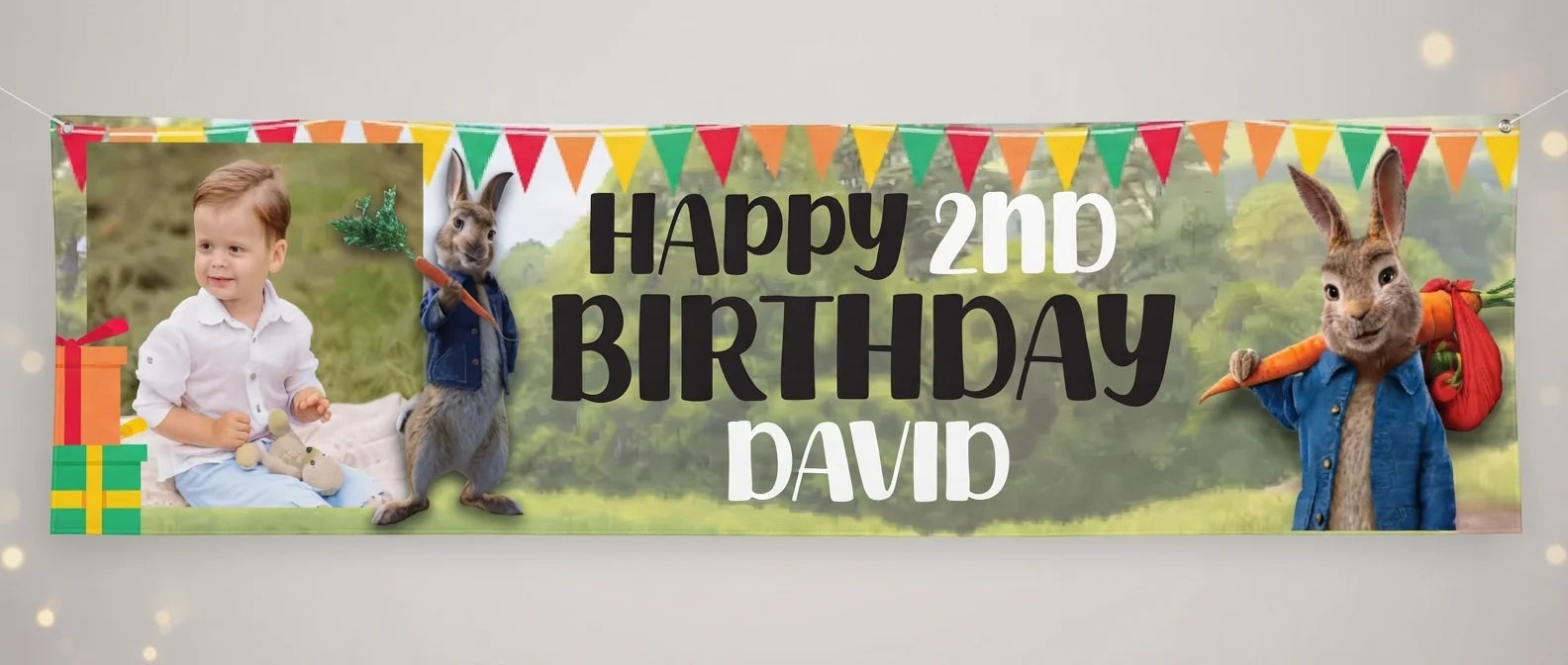 Personalised Peter Rabbit Birthday Banner displayed against a plain studio background