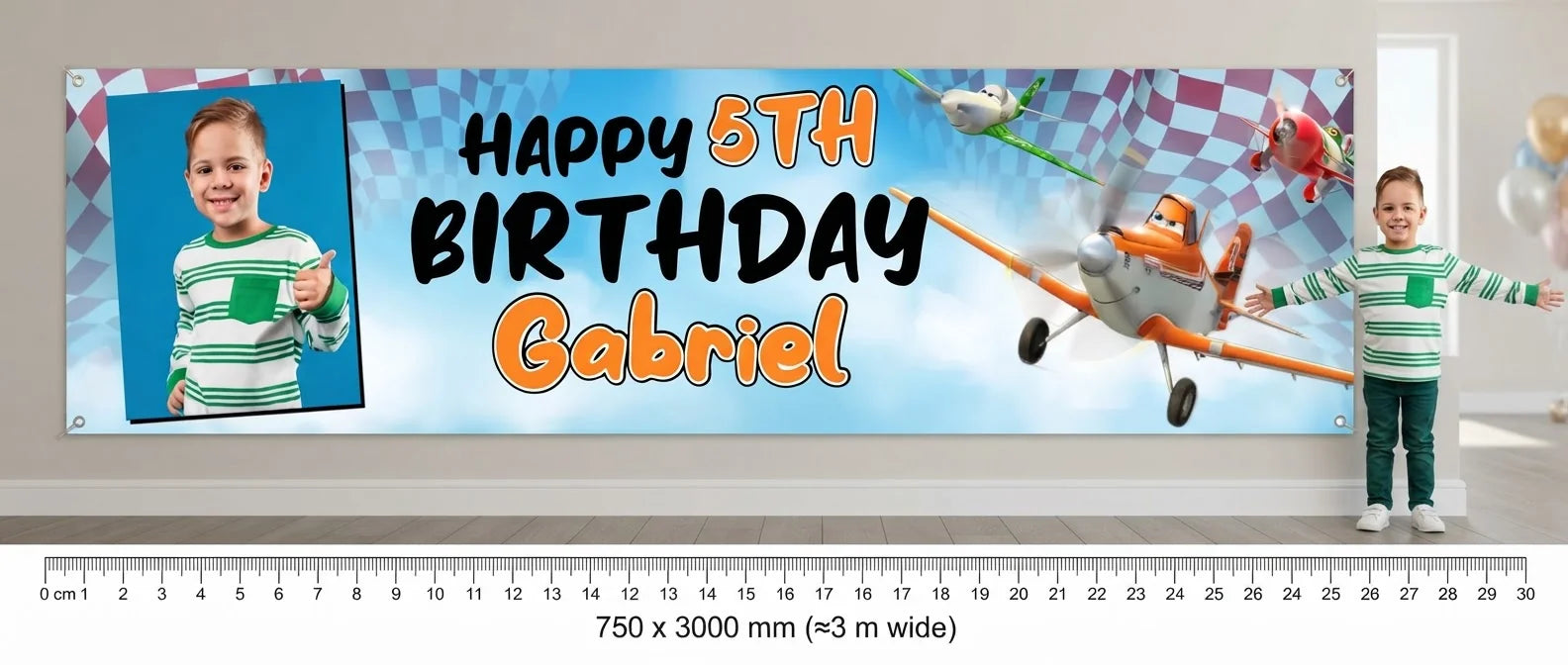Person standing beside the Planes Birthday Banner for scale, with size guide showing 750 x 3000 mm