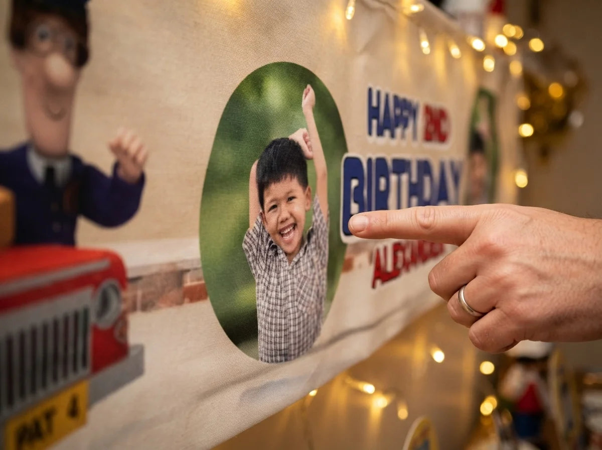 Close-up of the personalised name and photo printed on the Postman Pat Birthday Banner