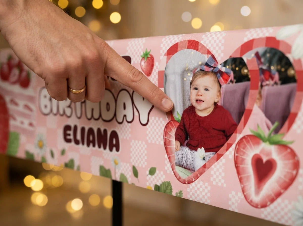 Close-up of the personalised name and photo printed on the Strawberry Birthday Banner