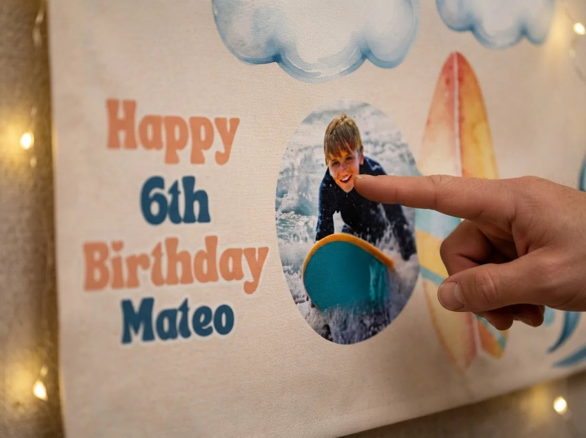 Close-up of the personalised name and photo printed on the Surfs Up Birthday Party Banner