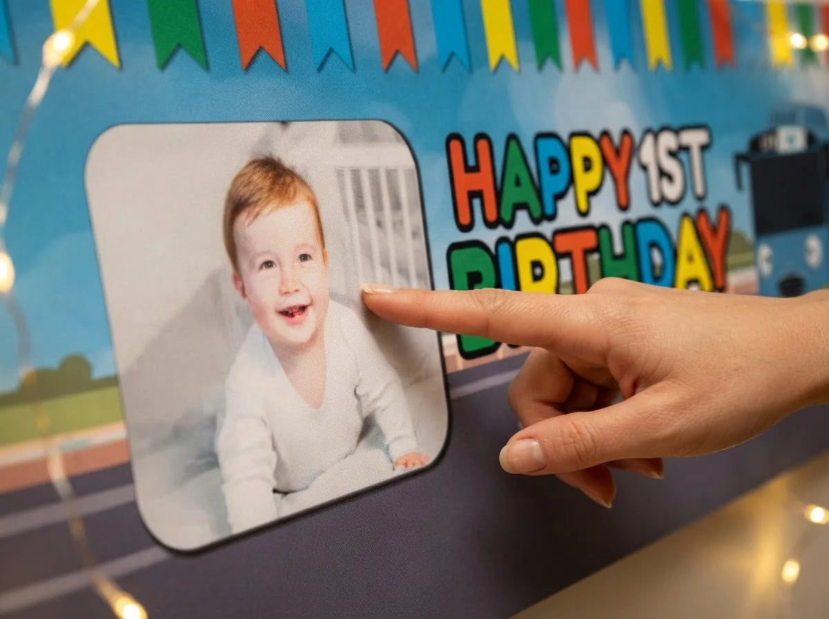 Close-up of the personalised name and photo printed on the Tayo The Little Bus Birthday Banner