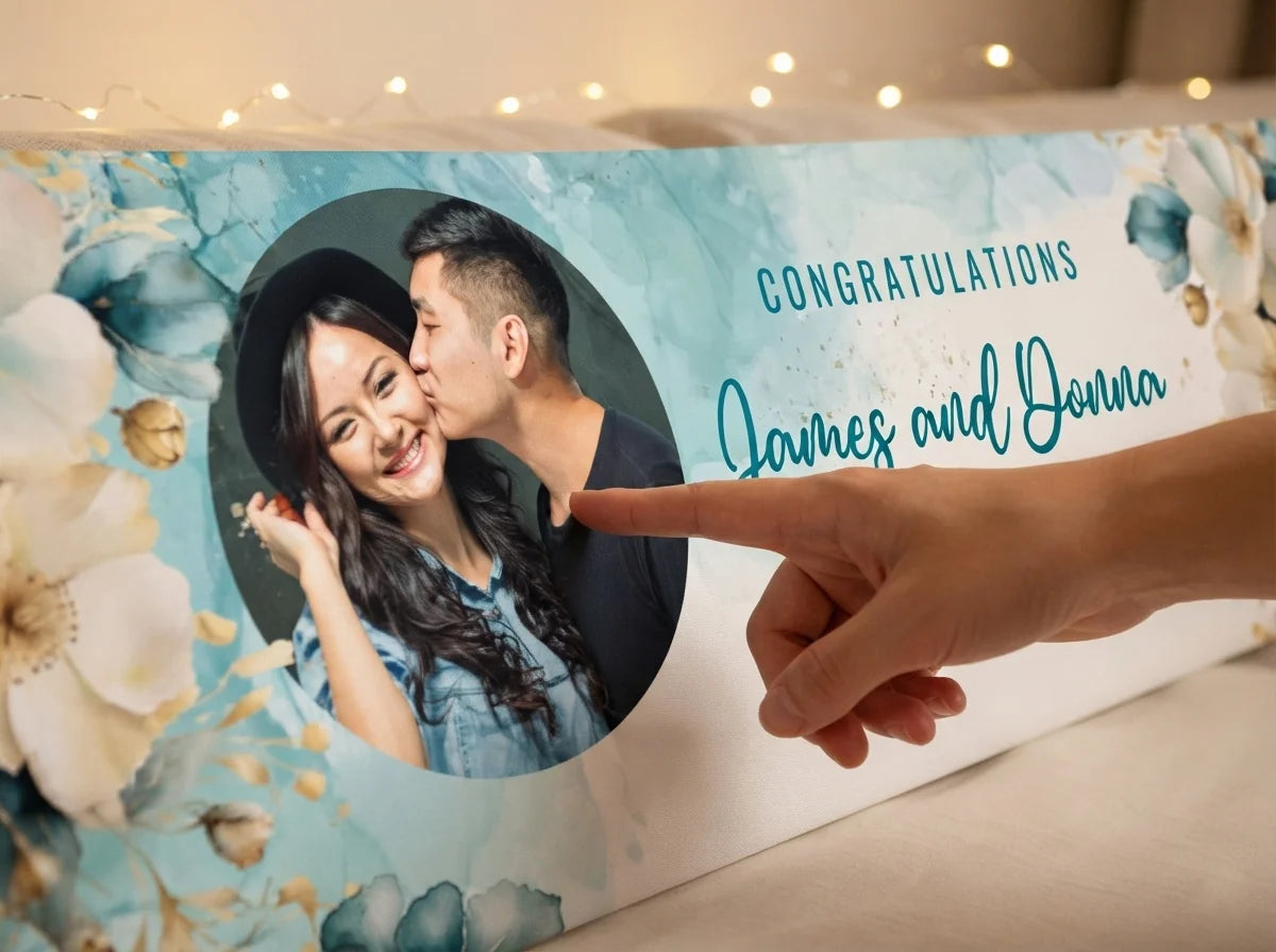 Close-up of the personalised name and photo printed on the Teal and Gold Flower Theme Wedding