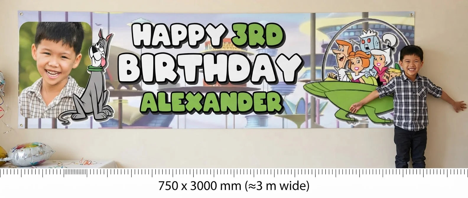 Person standing beside the The Jetsons Birthday Banner for scale, with size guide showing 750 x 3000 mm