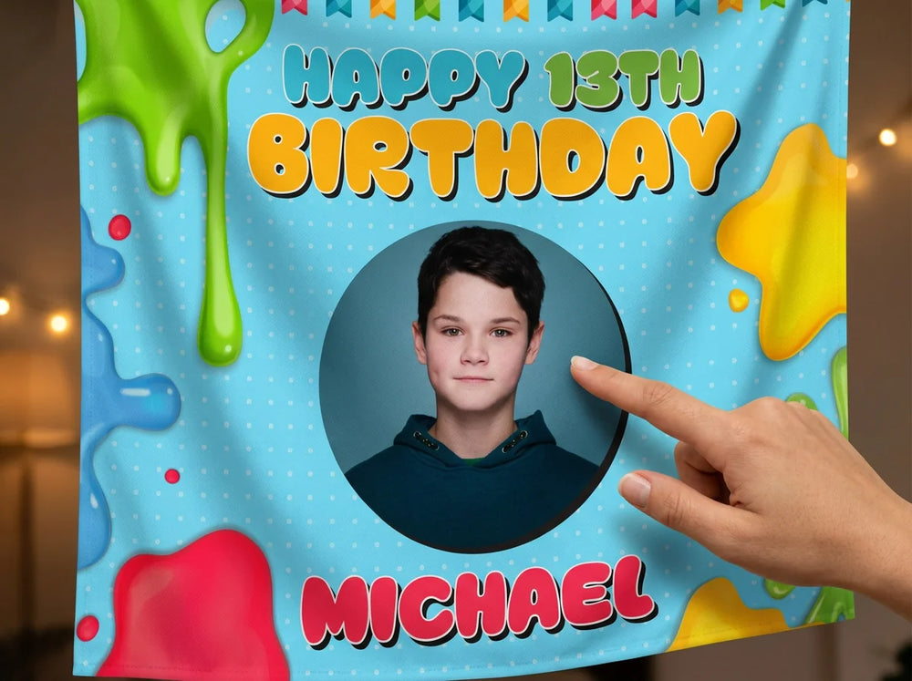 Close-up of the personalised name and photo printed on the Slime Theme Birthday Party Banner