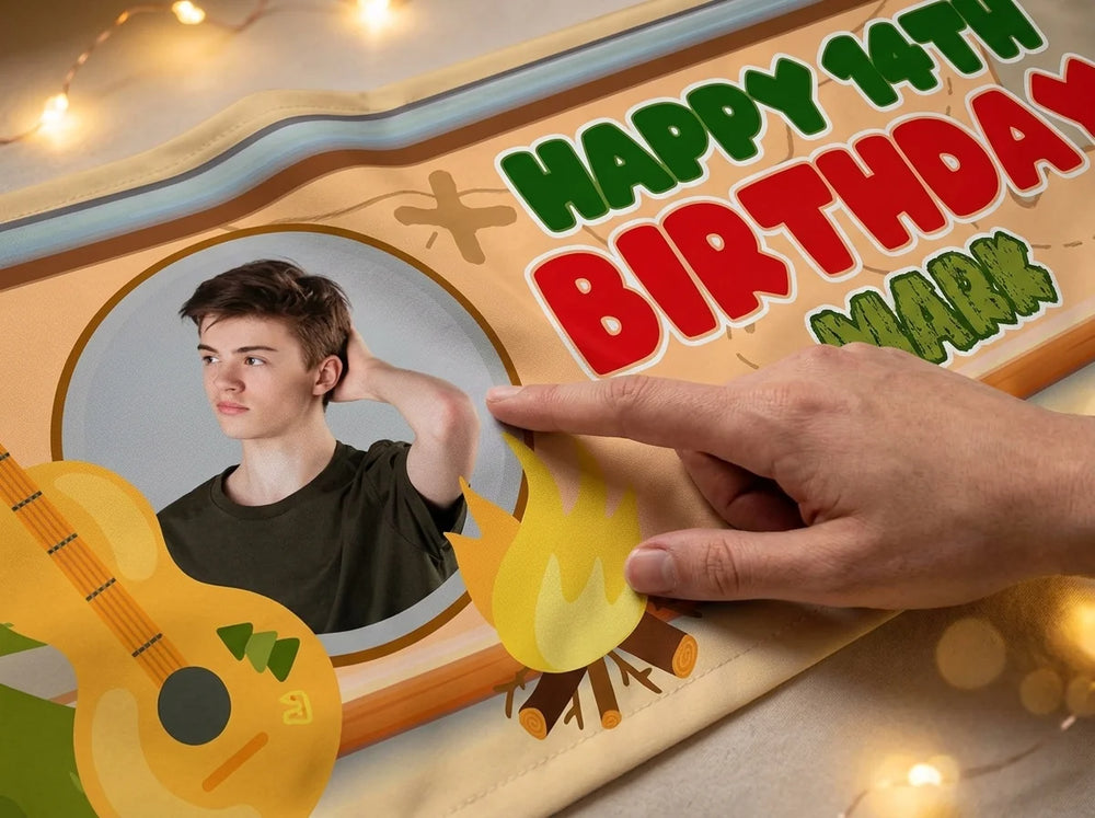 Close-up of the personalised name and photo printed on the Camping Theme Birthday Party Banner