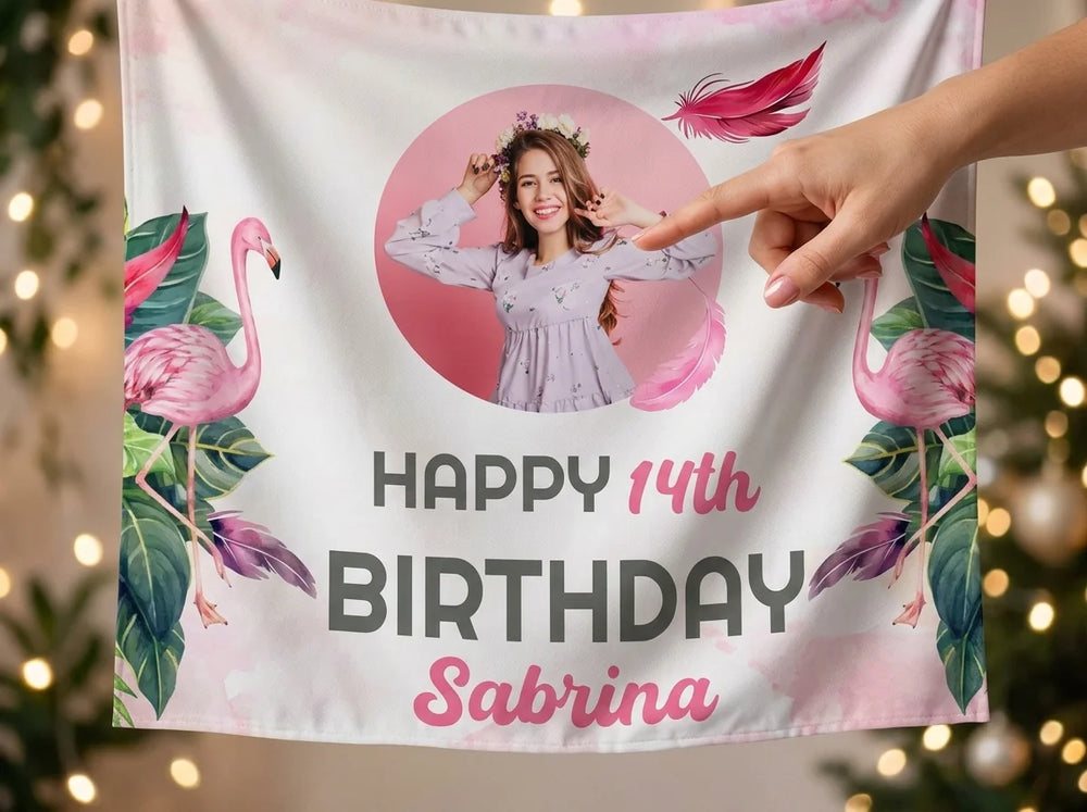 Close-up of the personalised name and photo printed on the Tropical Flamingo Theme Birthday Party Banner