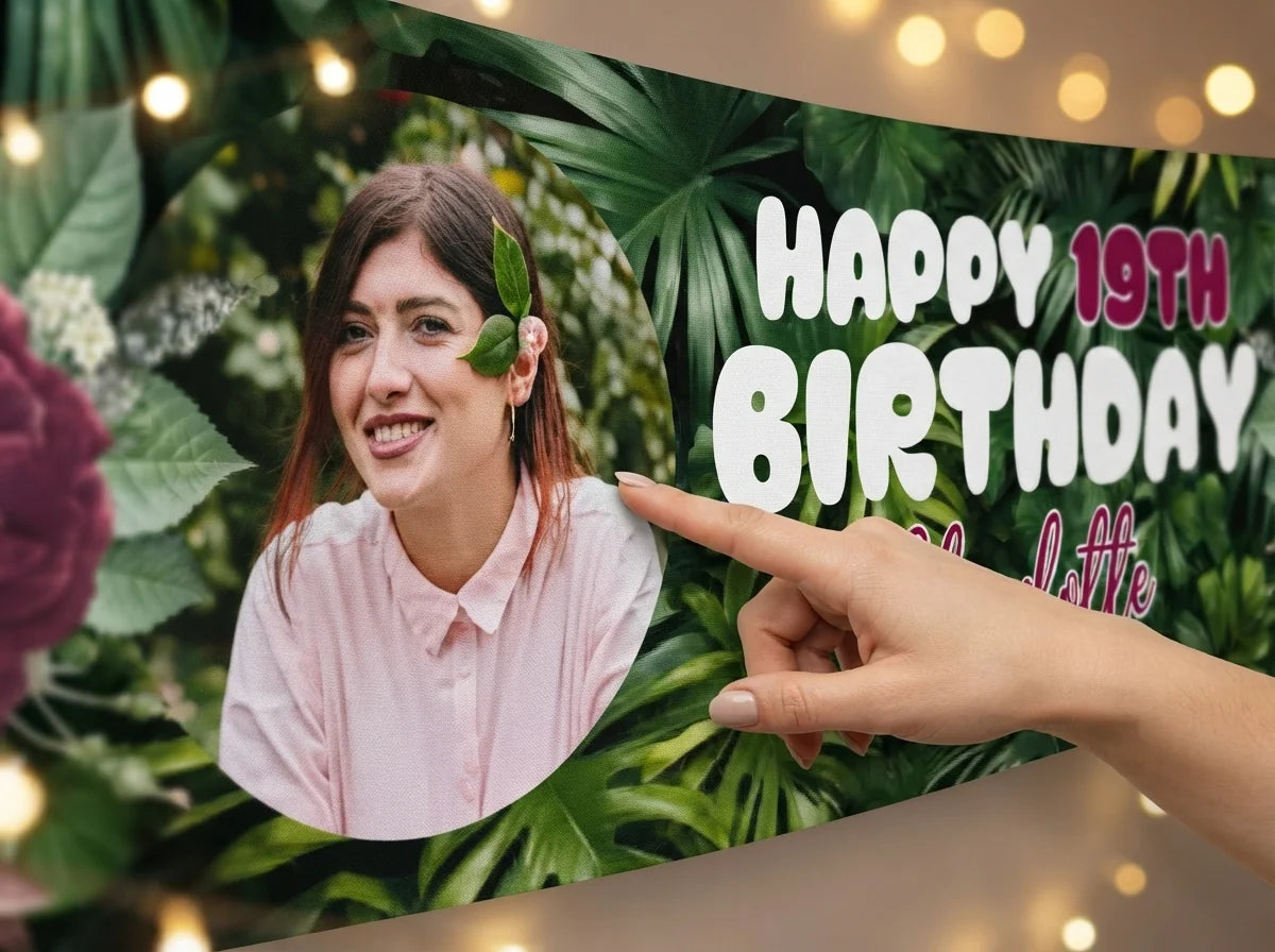 Close-up of the personalised name and photo printed on the Maroon Floral Birthday Party Banner