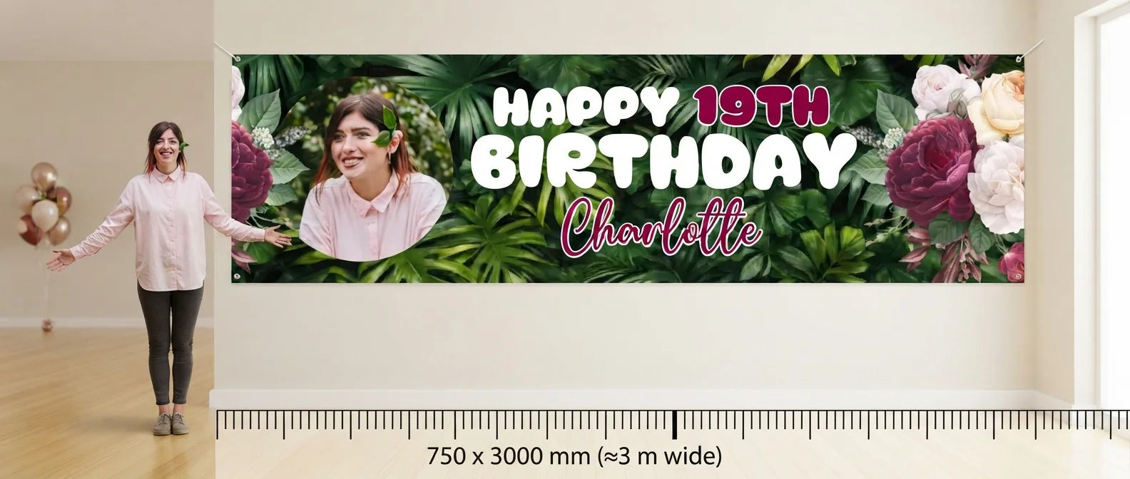 Person standing beside the Maroon Floral Birthday Party Banner for scale, with size guide showing 750 x 3000 mm