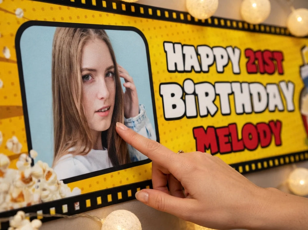 Close-up of the personalised name and photo printed on the Movie Night Birthday Party Banner
