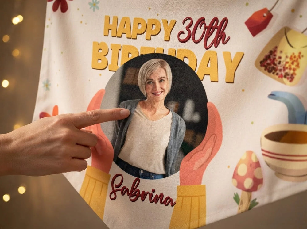 Close-up of the personalised name and photo printed on the Tea Party Birthday Banner