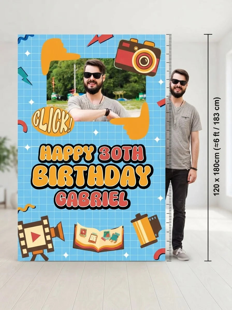 Person standing beside the Vintage Camera Birthday Party Mega Card for scale in a size guide