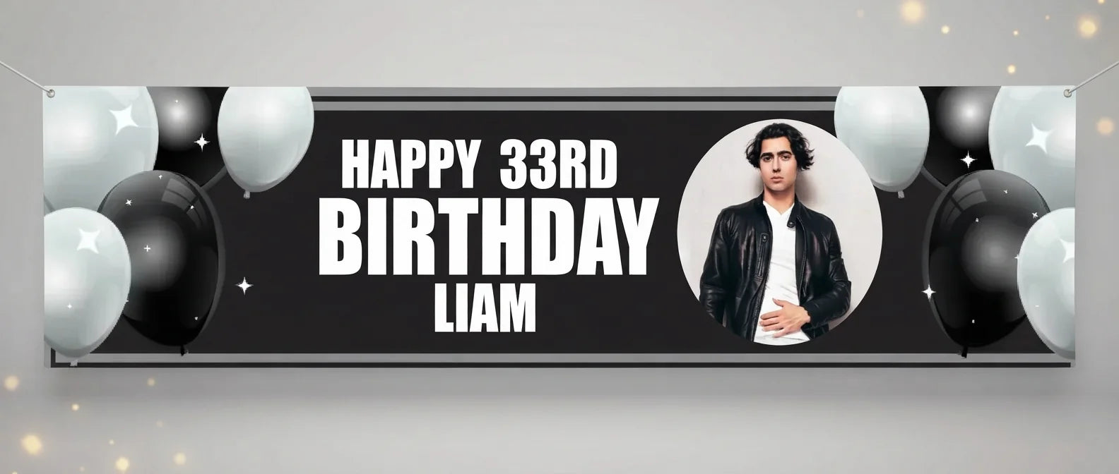 Personalised Black and White Theme Birthday Party Banner displayed against a plain studio background