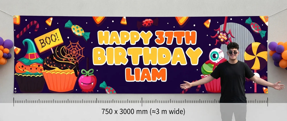 Person standing beside the Halloween Candies Theme Birthday Party Banner for scale, with size guide showing 750 x 3000 mm