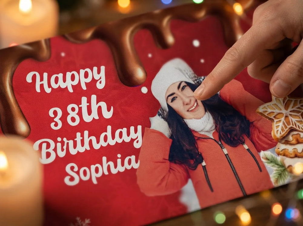 Close-up of the personalised name and photo printed on the Christmas Cookies and Cocoa Birthday Party Banner