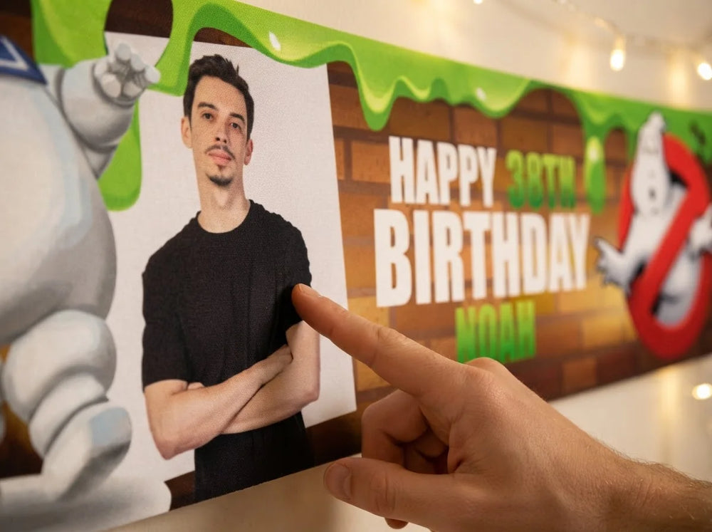 Close-up of the personalised name and photo printed on the Ghostbusters Theme Birthday Party Banner
