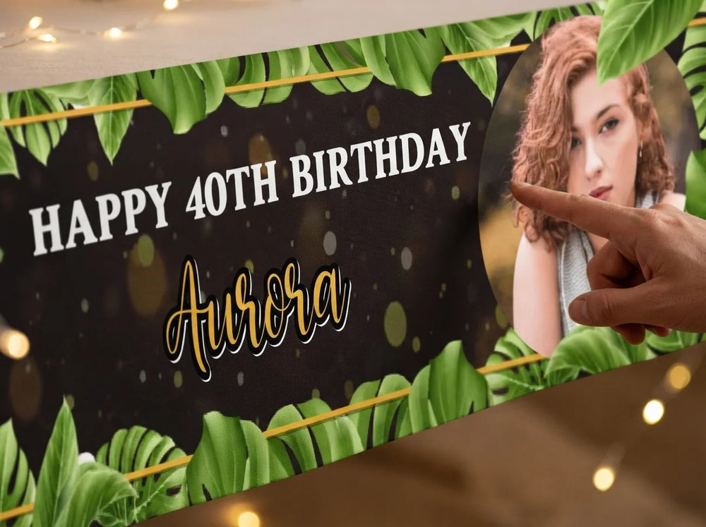 Close-up of the personalised name and photo printed on the Black Tropical Birthday Party Banner