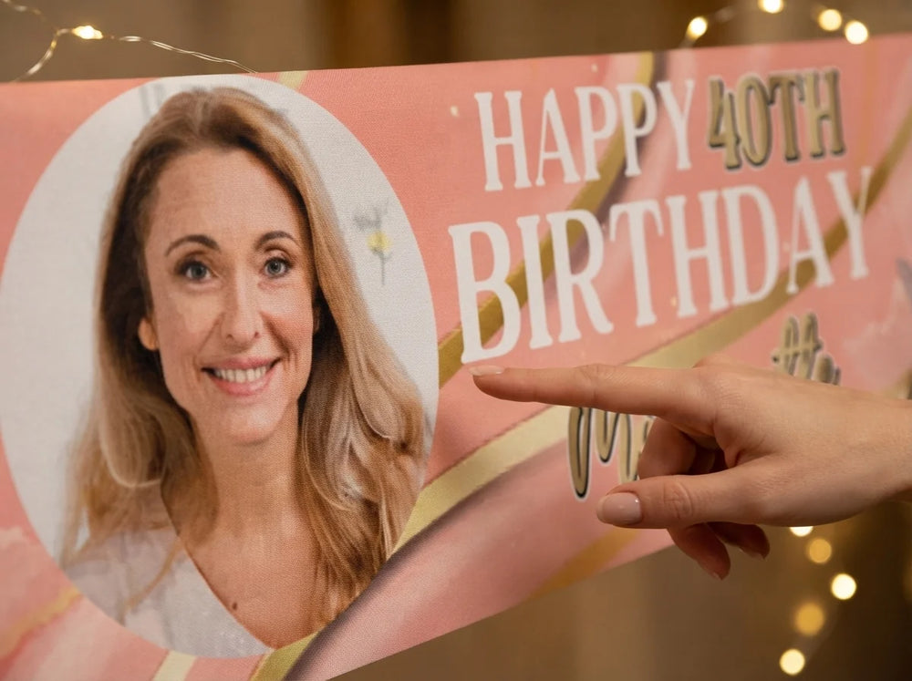 Close-up of the personalised name and photo printed on the Pink and Gold Theme Birthday Party Banner