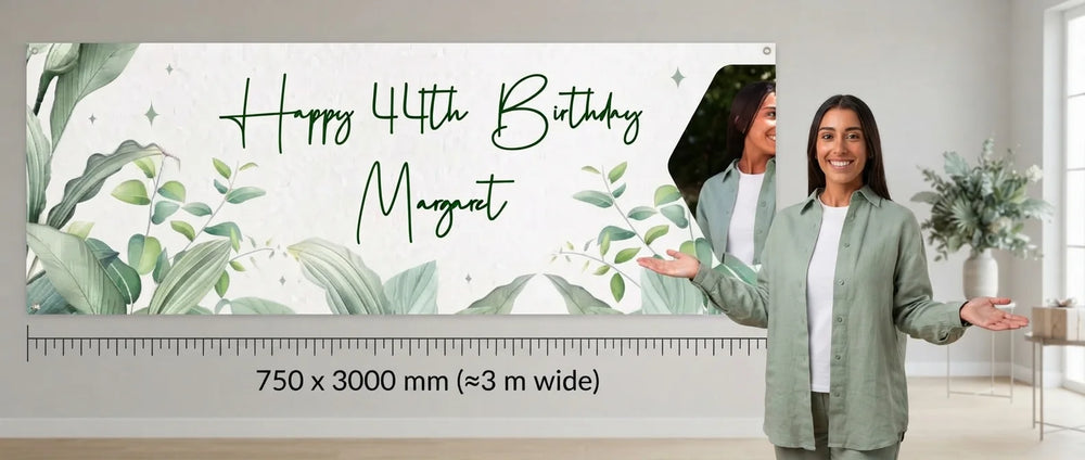 Person standing beside the Botanical Theme Birthday Party Banner for scale, with size guide showing 750 x 3000 mm