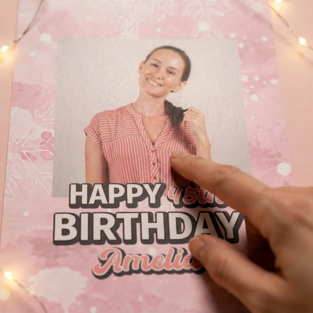 Close-up of the personalised name and photo printed on the Pink Christmas Birthday Party Mega Card