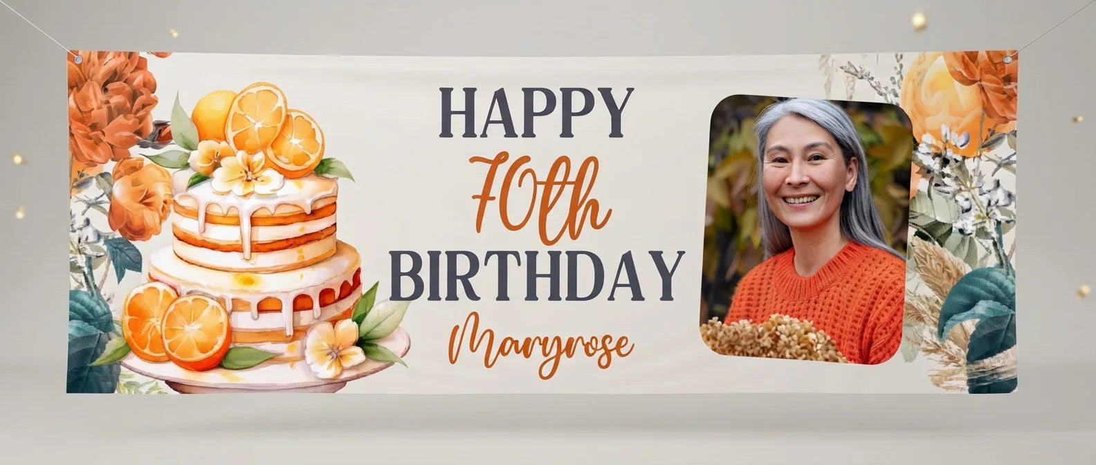 Personalised Orange Floral Theme Birthday Party Banner displayed against a plain studio background