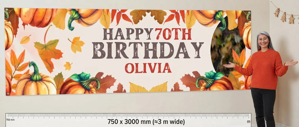 Person standing beside the Pumpkin Theme Birthday Party Banner for scale, with size guide showing 750 x 3000 mm