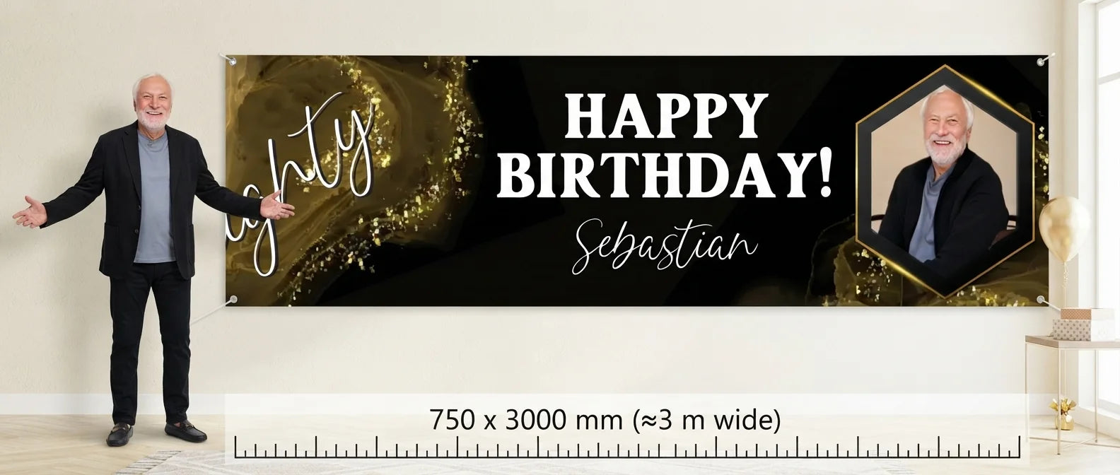 Person standing beside the Black & Gold Birthday Party Banner for scale, with size guide showing 750 x 3000 mm