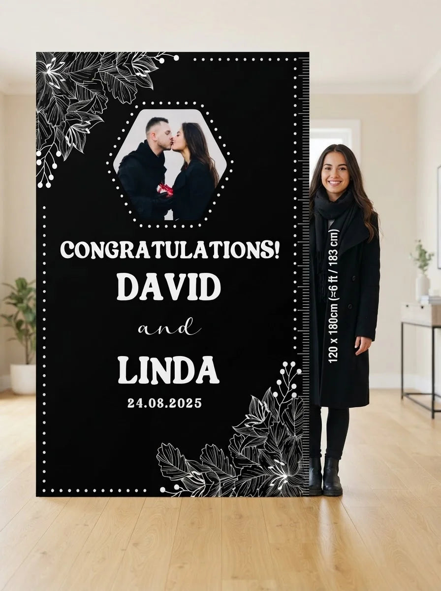 Person standing beside the Black and White Theme Wedding Mega Card for scale in a size guide