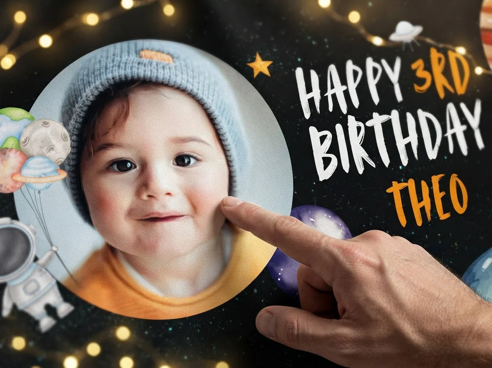 Close-up of the personalised name and photo printed on the Blast Off Outerspace Birthday Party Banner