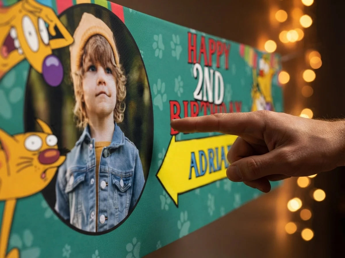 Close-up of the personalised name and photo printed on the CatDog Birthday Banner
