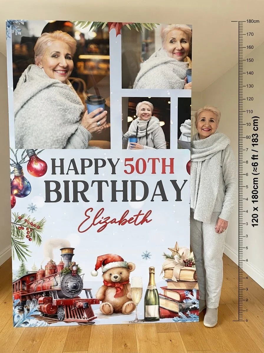 Person standing beside the Christmas Train Birthday Party Mega Card for scale in a size guide