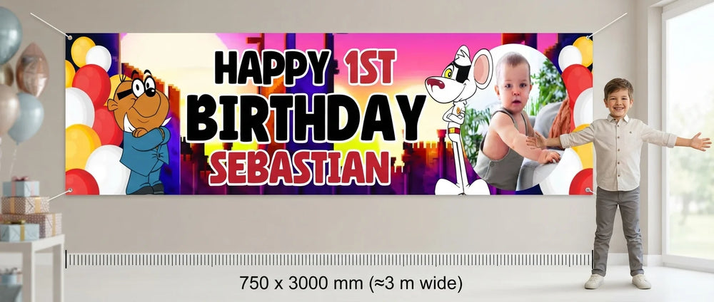 Person standing beside the Danger Mouse Birthday Banner for scale, with size guide showing 750 x 3000 mm